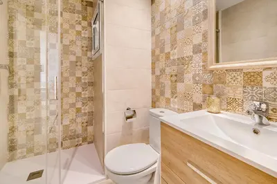 Un baño de Hauzify I Apartament Rosa dels Vents