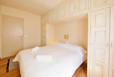 Cama o camas de una habitación en Casa Concha Apartamentos en primera linea de mar