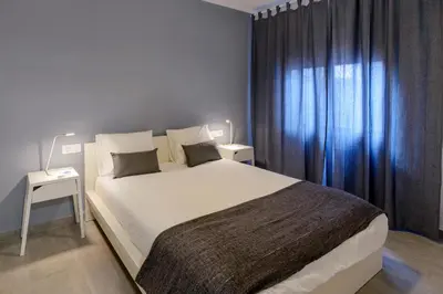Cama o camas de una habitación en NS Apartaments
