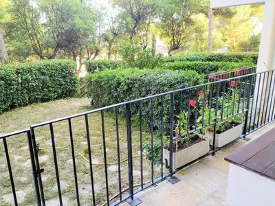 Jardín al aire libre en Calella golfet sobremar