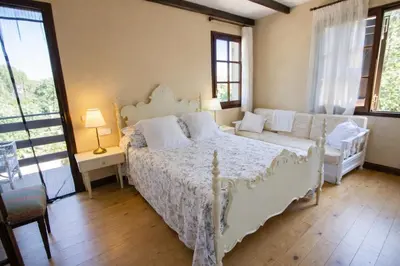 Cama o camas de una habitación en Catalunya Casas Delightful destination in the heart of Costa Brava