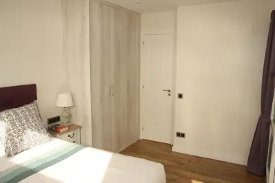 Cama o camas de una habitación en Seafront Apartment in Palamós