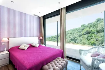 Cama o camas de una habitación en Lujo con piscina climatizada,jacuzzi,playa privada