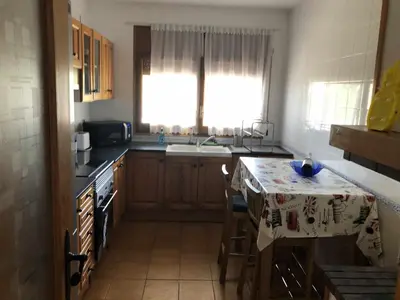Una cocina o zona de cocina en Casa Bellavista con piscina en Caldes Costa Brava