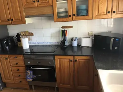 Una cocina o zona de cocina en Casa Bellavista con piscina en Caldes Costa Brava