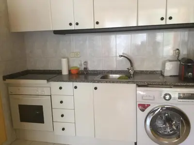 Una cocina o zona de cocina en El Apartamento Luminoso