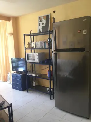 Una cocina o zona de cocina en El Apartamento Luminoso