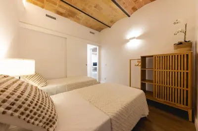 Cama o camas de una habitación en Bravissimo Cort Reial Entresol B