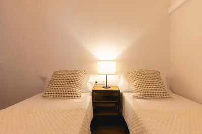 Cama o camas de una habitación en Bravissimo Cort Reial Entresol B