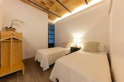 Cama o camas de una habitación en Bravissimo Cort Reial Entresol B