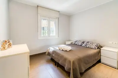Cama o camas de una habitación en Hauzify I Apartament Edelweiss