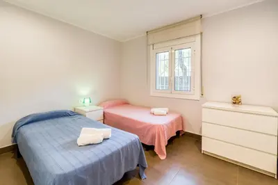Cama o camas de una habitación en Hauzify I Apartament Edelweiss