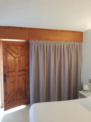 Cama o camas de una habitación en Hostal Ondina