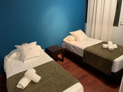 Cama o camas de una habitación en Palamós Apartamentos