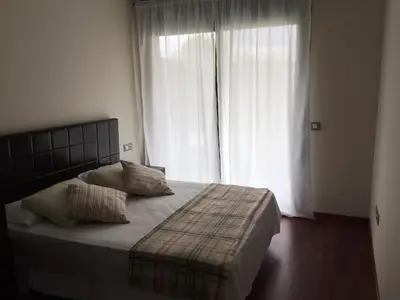 Cama o camas de una habitación en Palamós Apartamentos