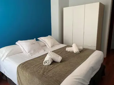 Cama o camas de una habitación en Palamós Apartamentos