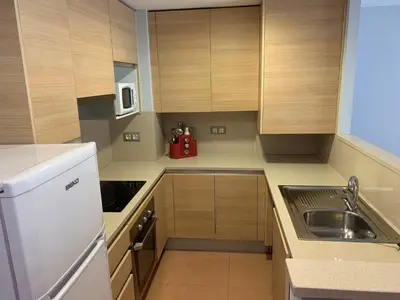 Una cocina o zona de cocina en Palamós Apartamentos