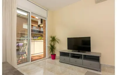 Una televisión o centro de entretenimiento en HomeHolidaysRentals Salvador