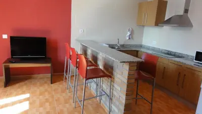 Una cocina o zona de cocina en Aparthotel Can Gallart