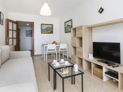 Una televisión o centro de entretenimiento en Apartment Olivier by Interhome
