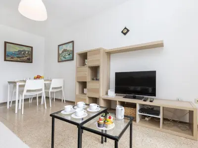 Una televisión o centro de entretenimiento en Apartment Olivier by Interhome