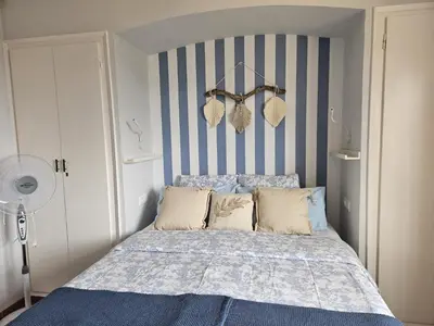 Cama o camas de una habitación en La Roqueta Hotel
