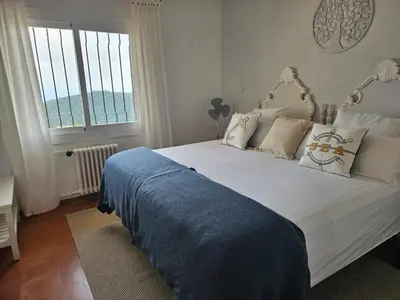 Cama o camas de una habitación en La Roqueta Hotel