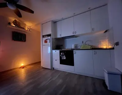 Una cocina o zona de cocina en Apartamento en la Playa de la Fosca
