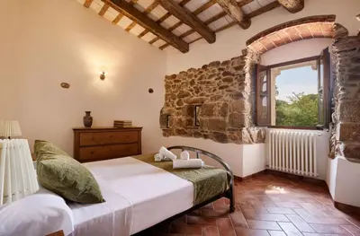Cama o camas de una habitación en Masia Torre Lloreta S.XIII