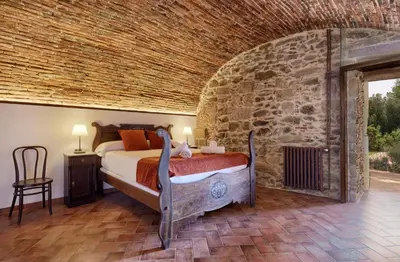 Cama o camas de una habitación en Masia Torre Lloreta S.XIII