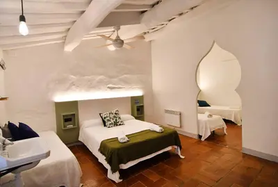 Cama o camas de una habitación en Hostal l'Estrella