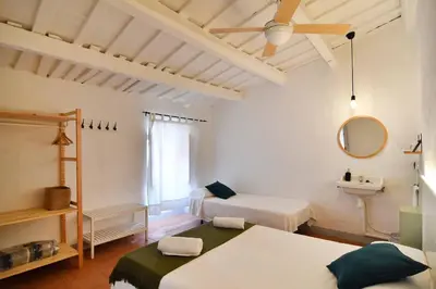 Cama o camas de una habitación en Hostal l'Estrella