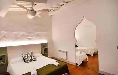 Cama o camas de una habitación en Hostal l'Estrella