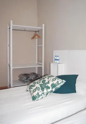 Cama o camas de una habitación en Hostal l'Estrella