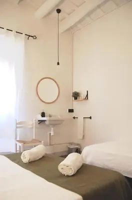 Cama o camas de una habitación en Hostal l'Estrella