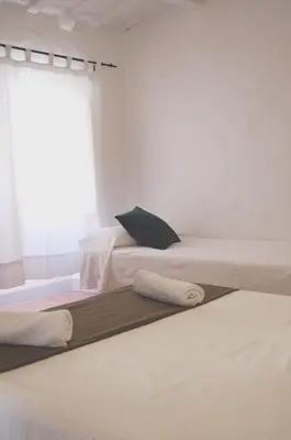 Cama o camas de una habitación en Hostal l'Estrella