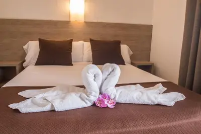 Cama o camas de una habitación en Hotel Hipica Park
