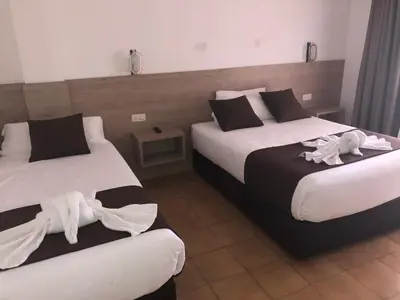 Cama o camas de una habitación en Hotel Hipica Park