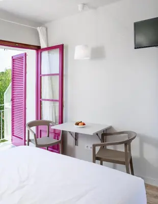 Cama o camas de una habitación en Bellsol Rooms