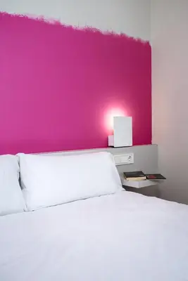 Cama o camas de una habitación en Bellsol Rooms