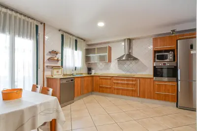Una cocina o zona de cocina en Casa Cerca De La Playa