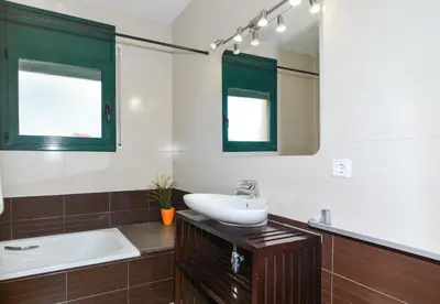 Un baño de Casa Cerca De La Playa
