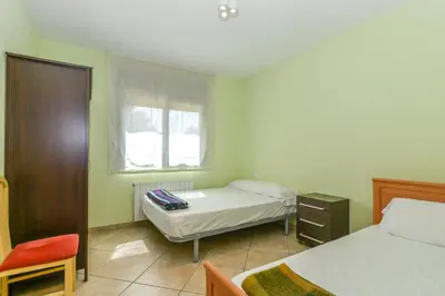 Cama o camas de una habitación en Casa Cerca De La Playa