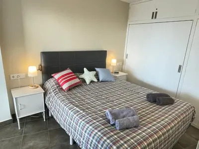 Cama o camas de una habitación en Illa Blanca Mar Fornells