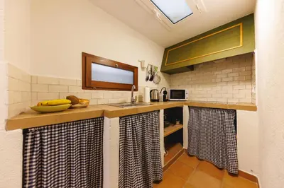 Una cocina o zona de cocina en Bravissimo Girona 1593, Pedestrian Area with Medieval charm