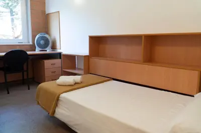 Cama o camas de una habitación en Residencia Universitaria Resa Campus de Montilivi