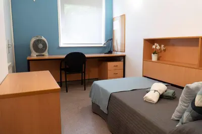 Cama o camas de una habitación en Residencia Universitaria Resa Campus de Montilivi
