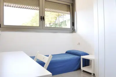 Cama o camas de una habitación en Residencia Universitaria Resa Campus de Montilivi