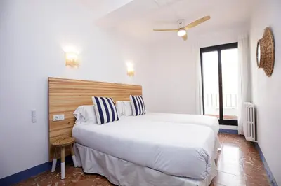 Cama o camas de una habitación en Hotel Casa Mas