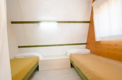 Cama o camas de una habitación en Camping Relax Ge